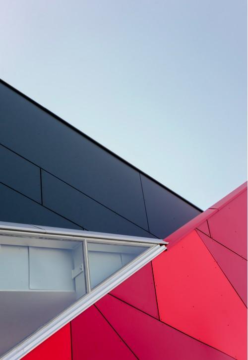 abstract puzzle red triangle building