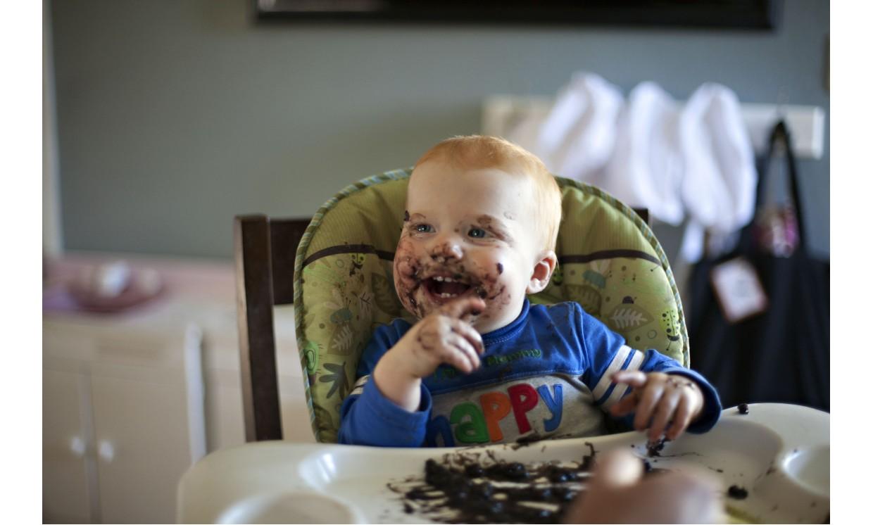 baby toddler boy enjoying dinner cute