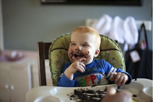 baby toddler boy enjoying dinner cute