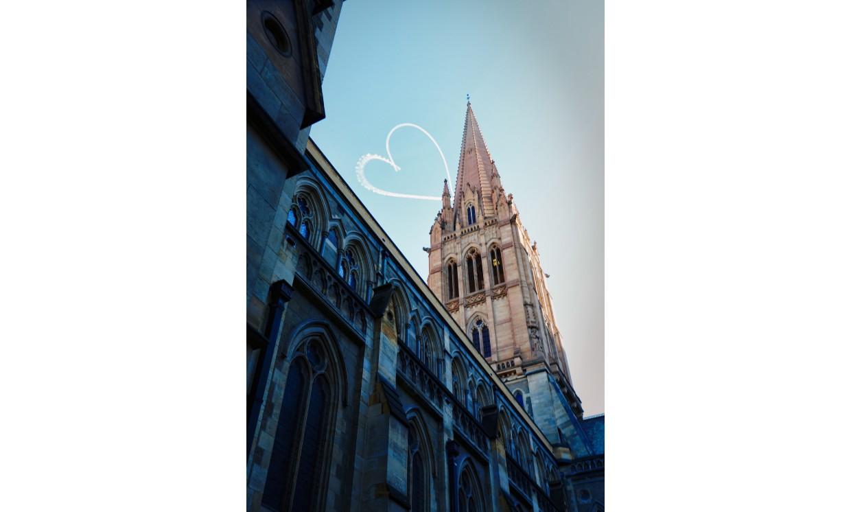 building sky writer writes heart church