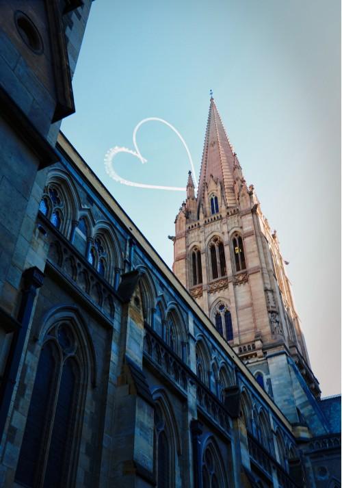 building sky writer writes heart church
