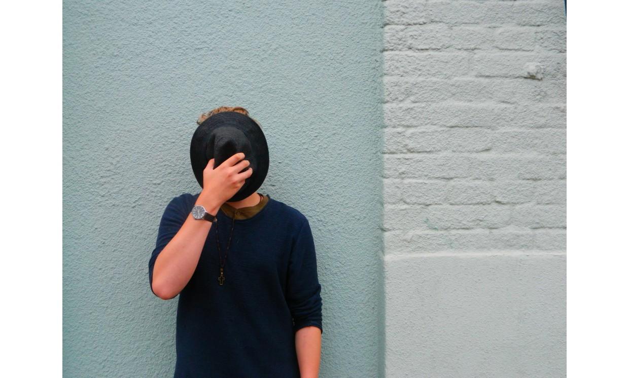 background young  adult blue white wall